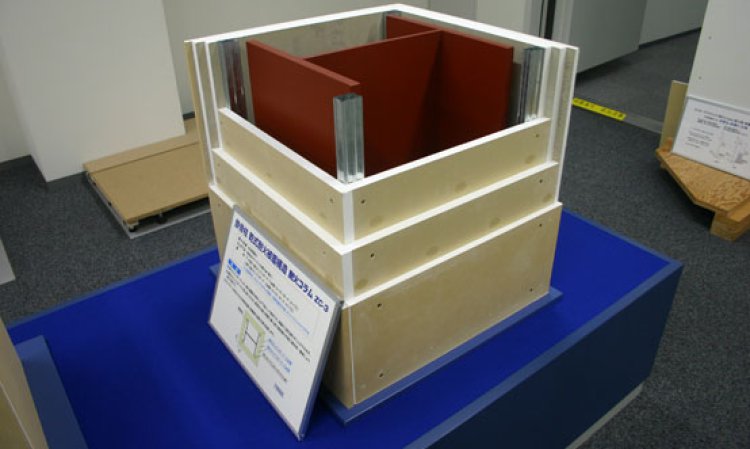 Gypsum wallboard pillars built around steel columns.